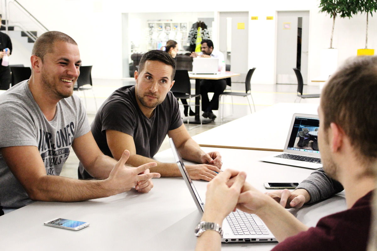 Erik, Chris, Matt and the Pixel Kicks team discussing a website project