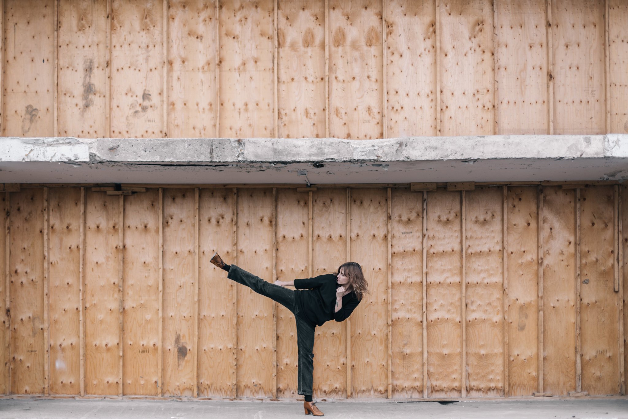 woman kicking from burst website