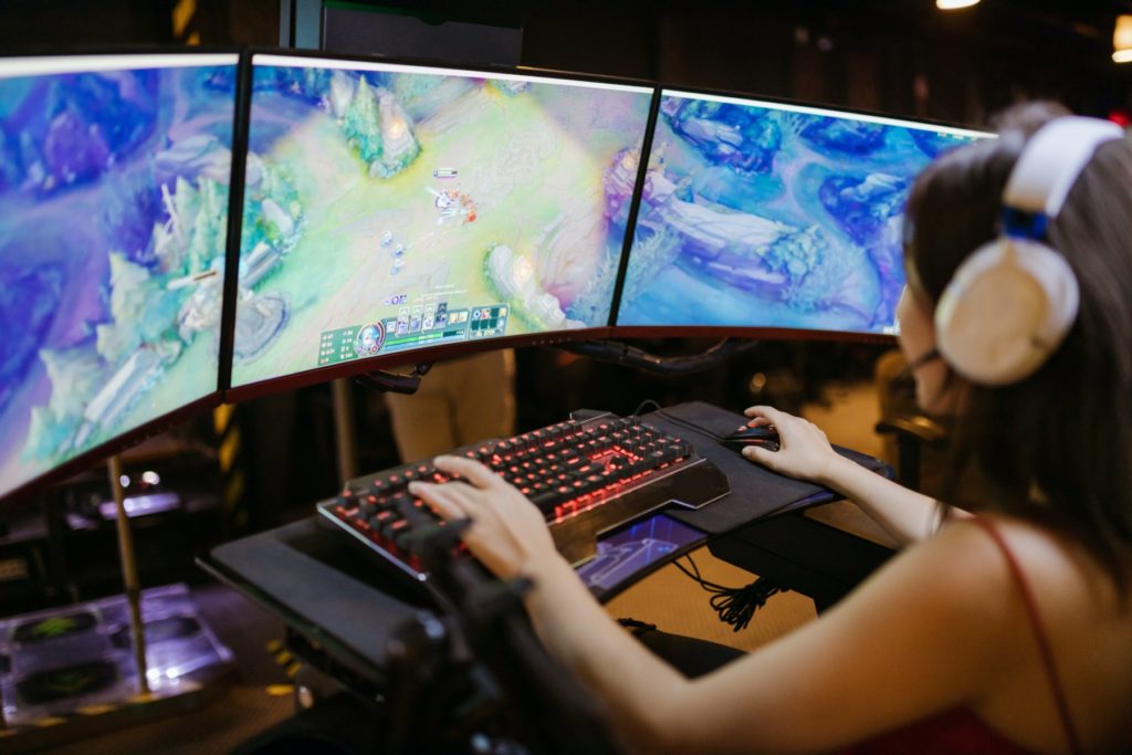 girl playing an esports game