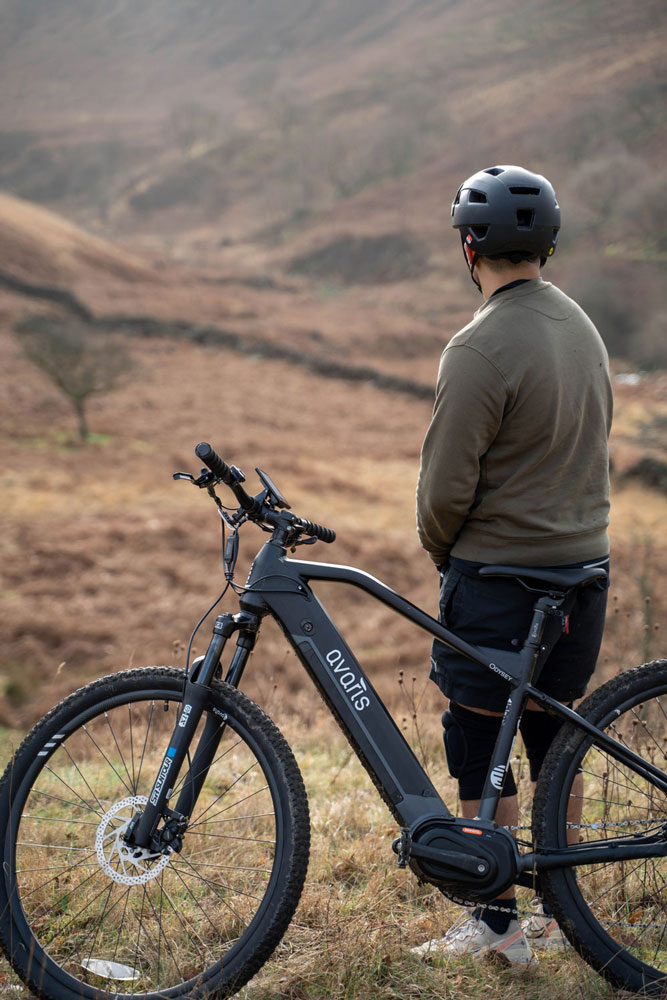 man with his mountain bike in the countryside