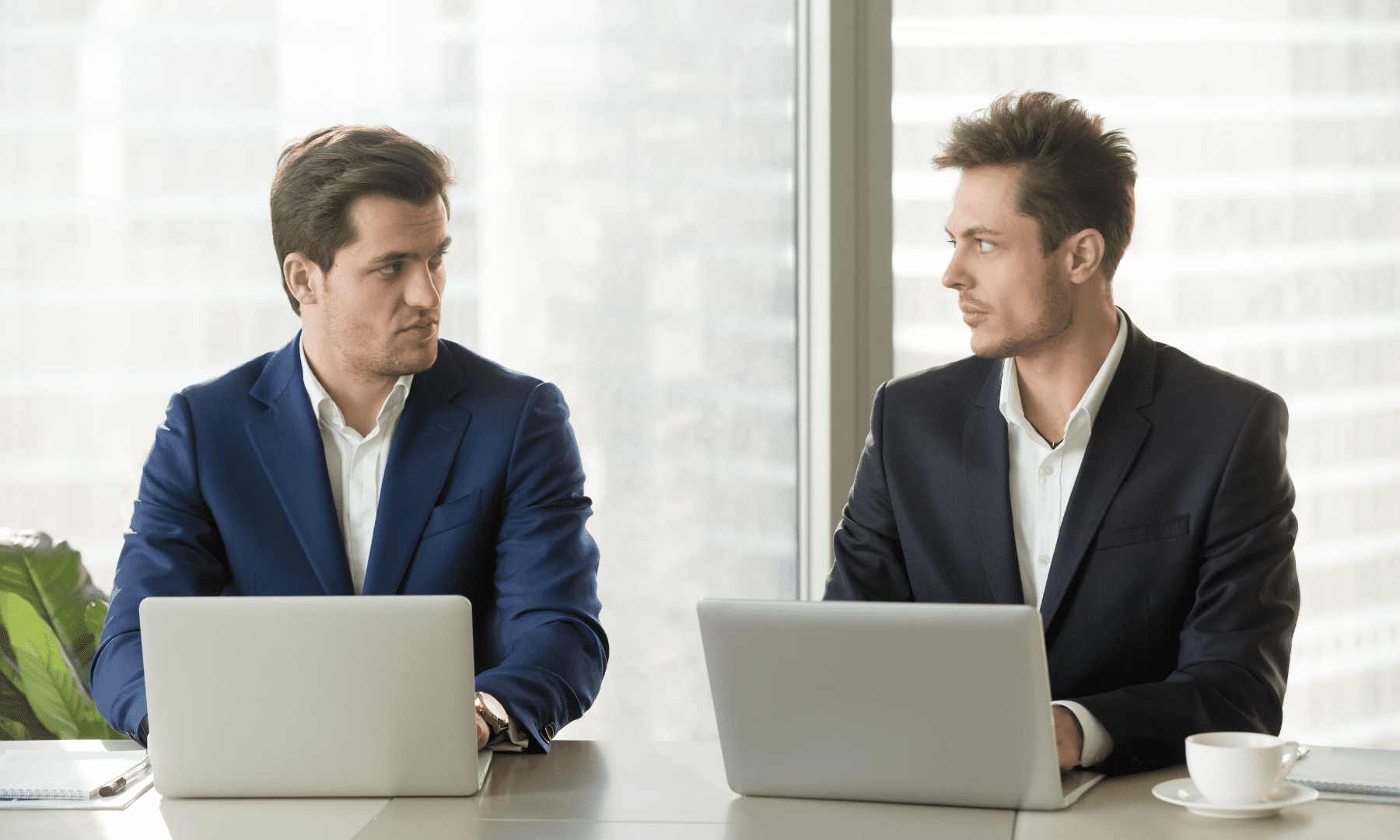 Two workers from different companies competing