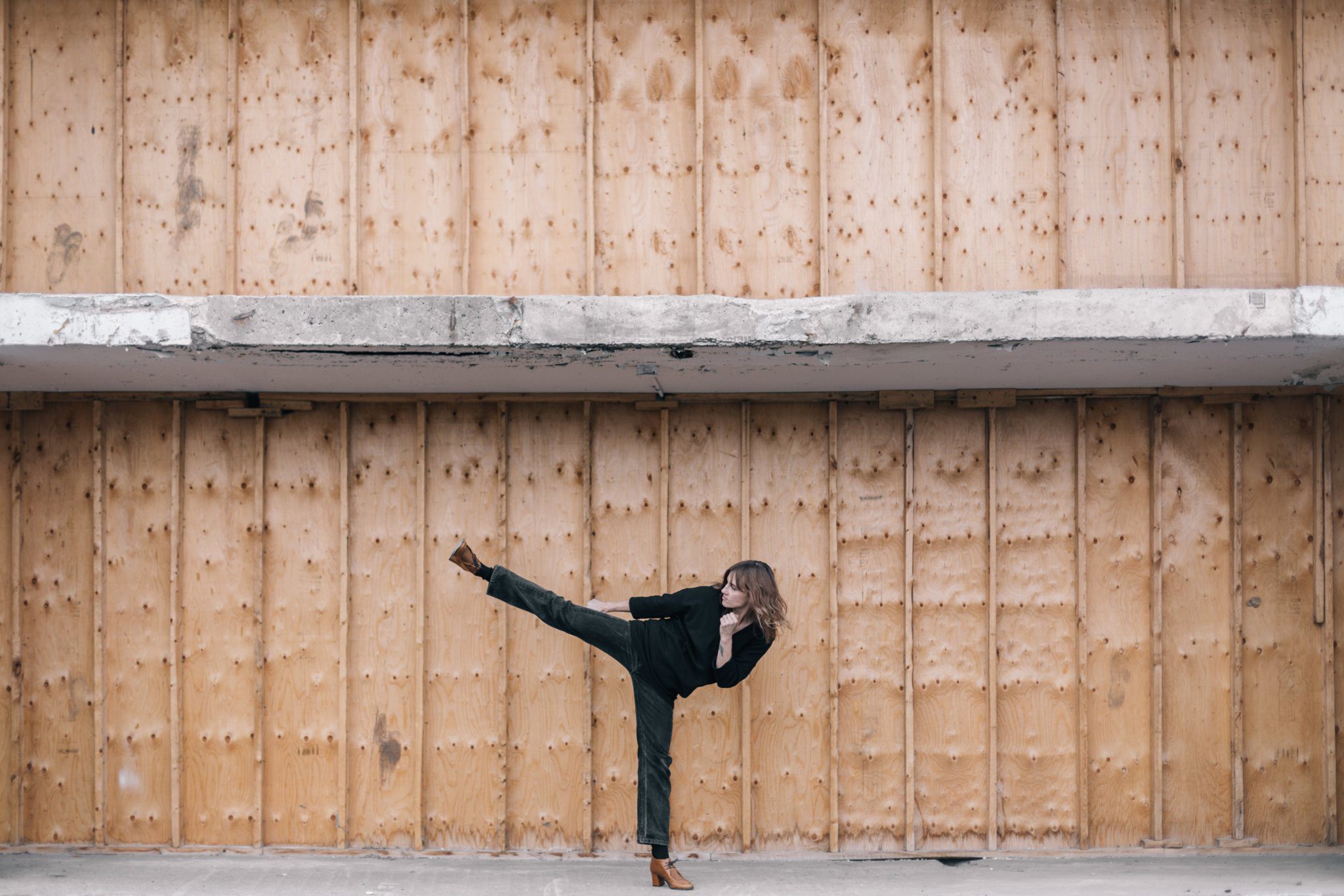 woman kicking from burst website