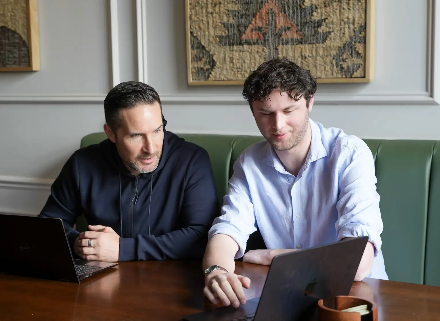 Chris Buckley and James Knowles discussing a Shopify project