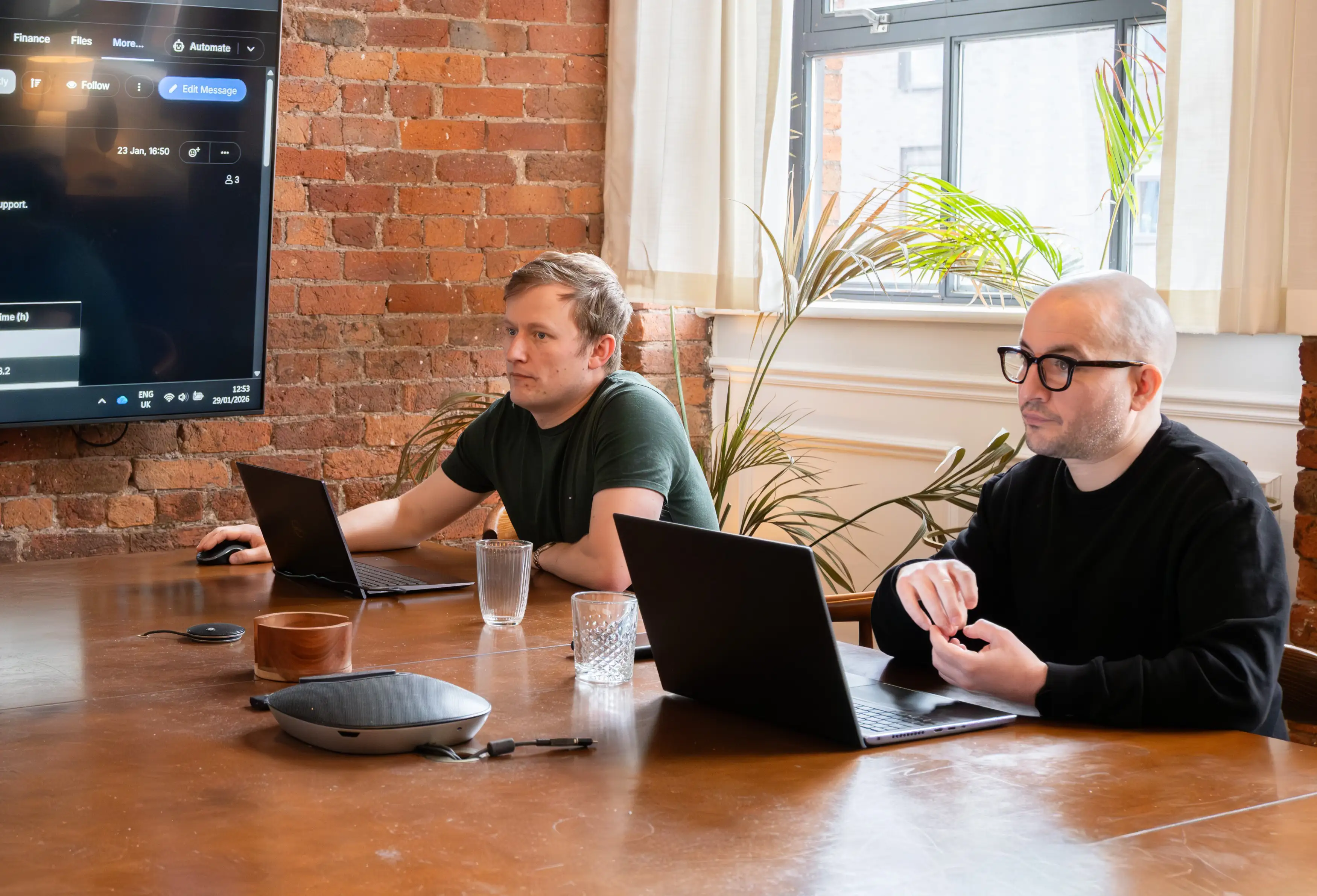 The Pixel Kicks projects team discussing a new Shopify B2B ecommerce project